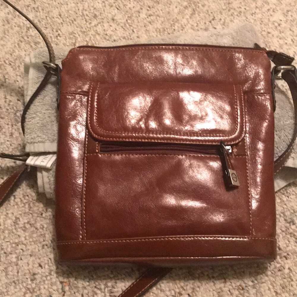 Brown leather crossbody purse by Giana Bernini